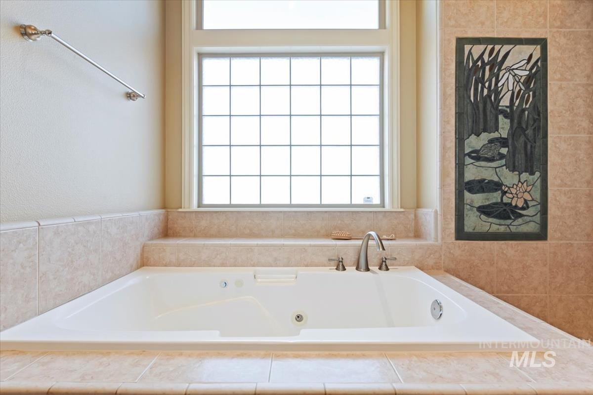 Bathroom with a jetted tub