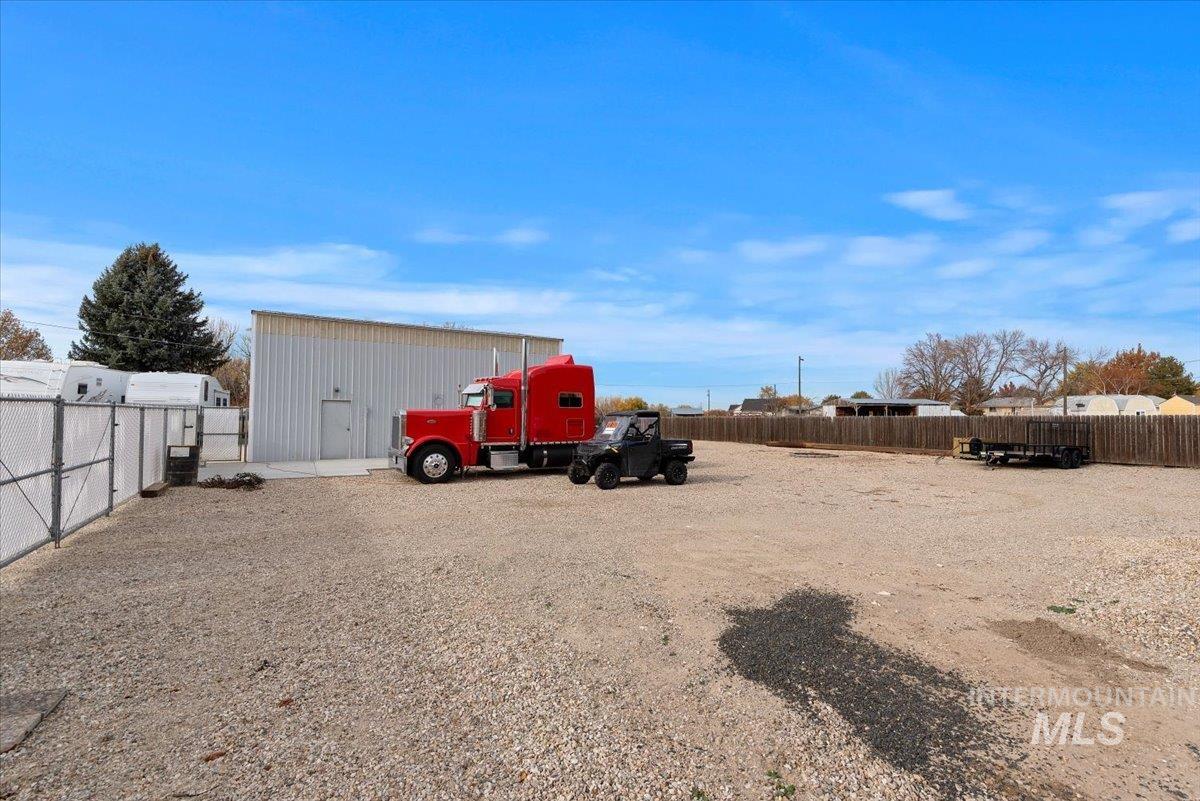 View of yard featuring an outdoor structure