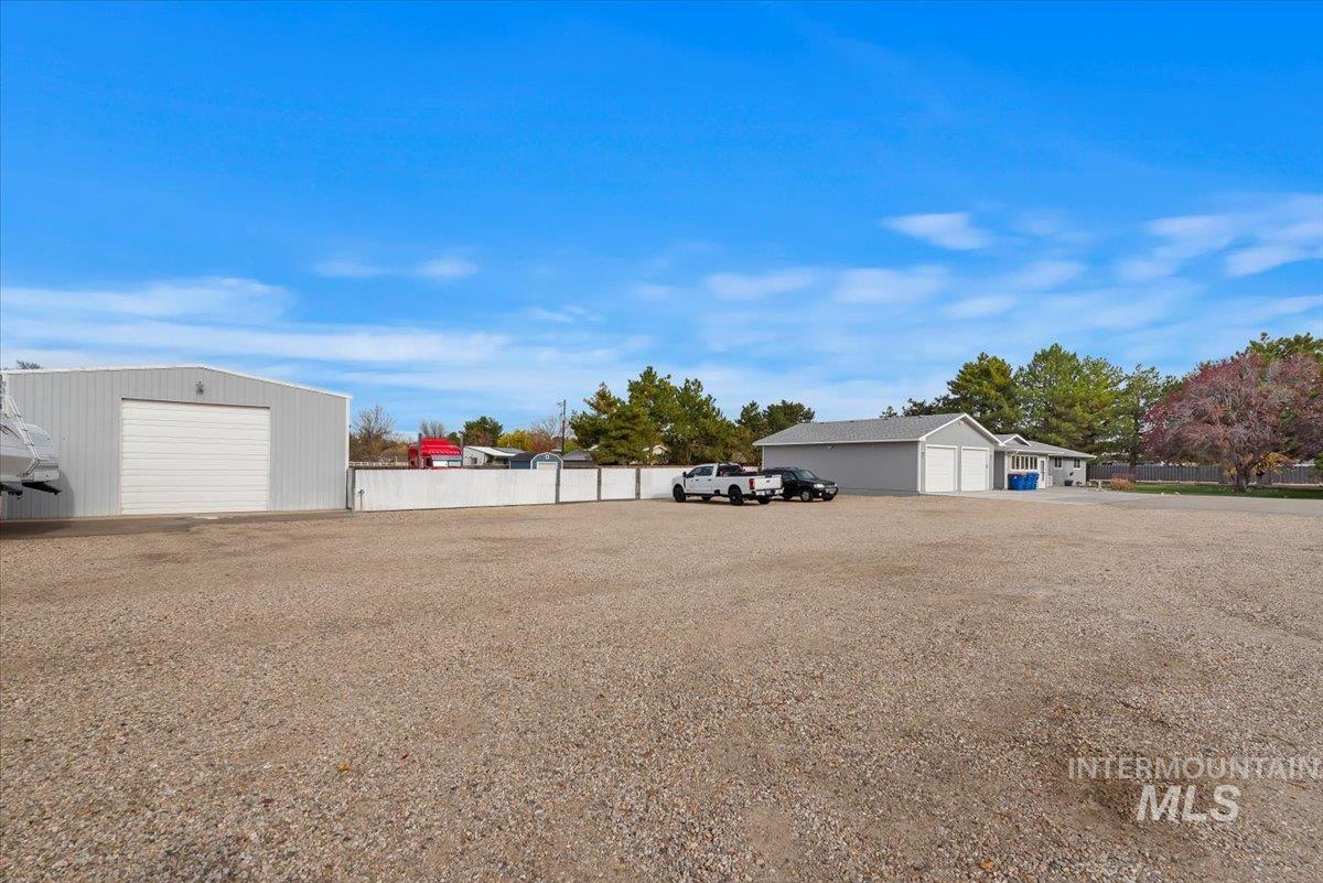 View of yard with an outbuilding