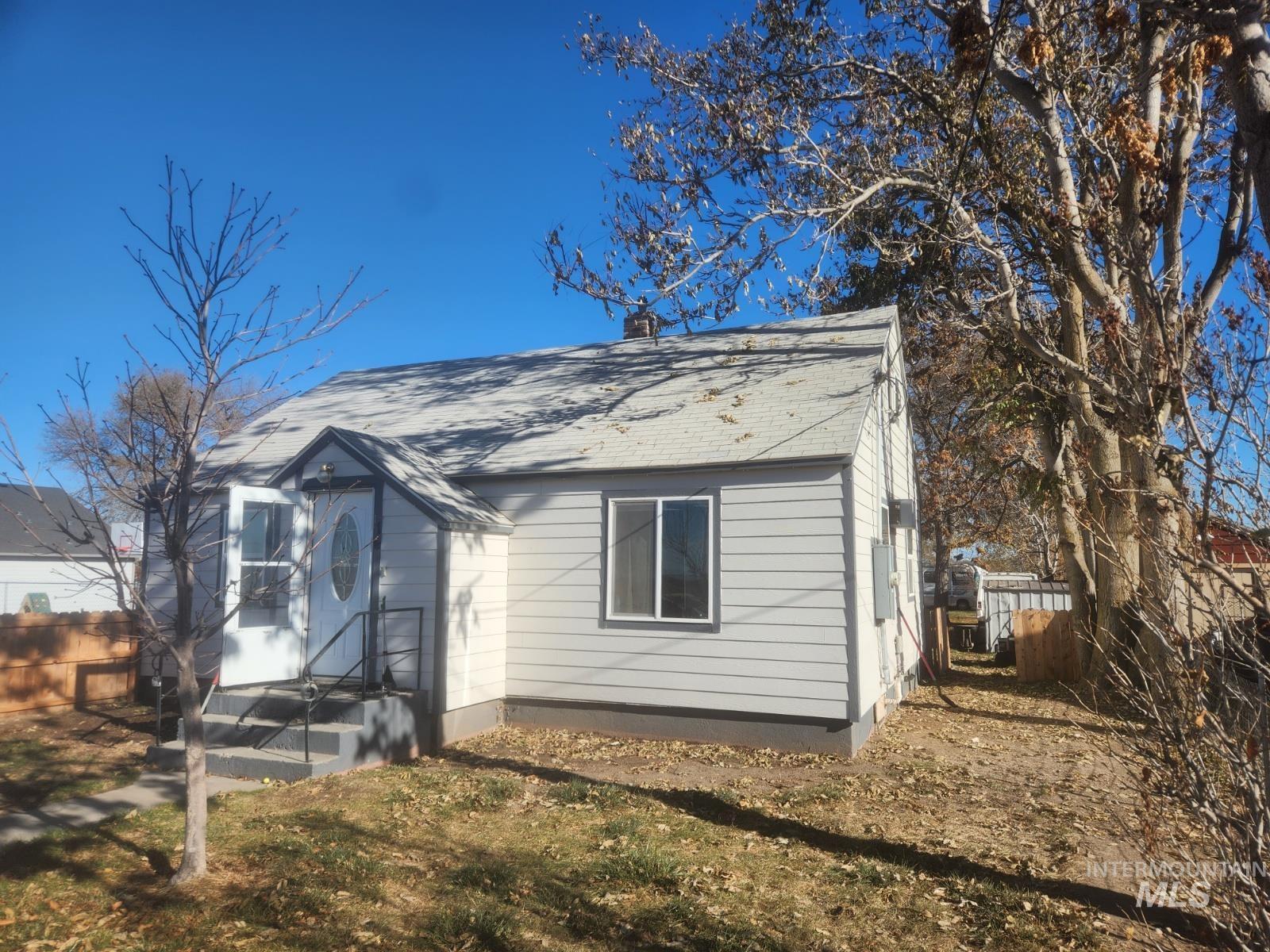 View of home's exterior featuring a shingled roof