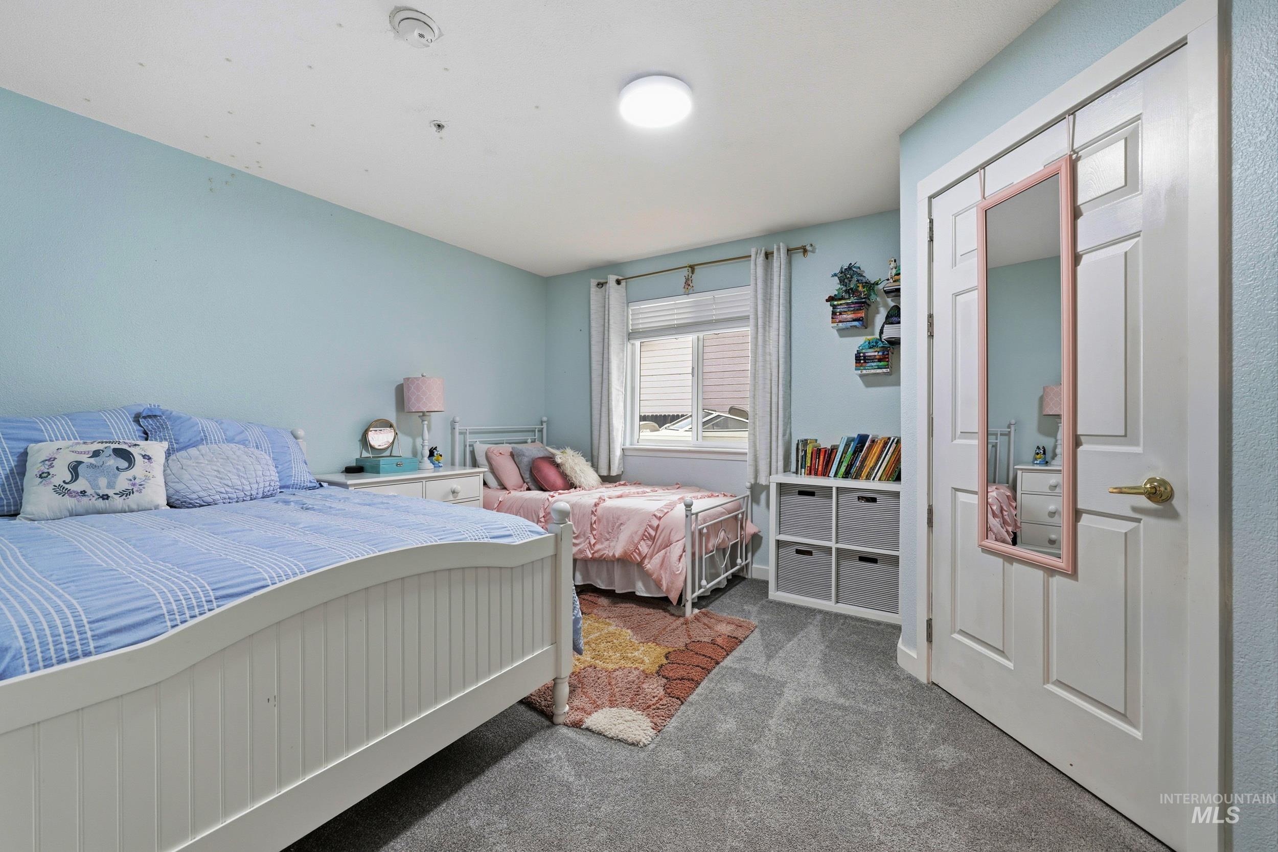 Bedroom featuring carpet