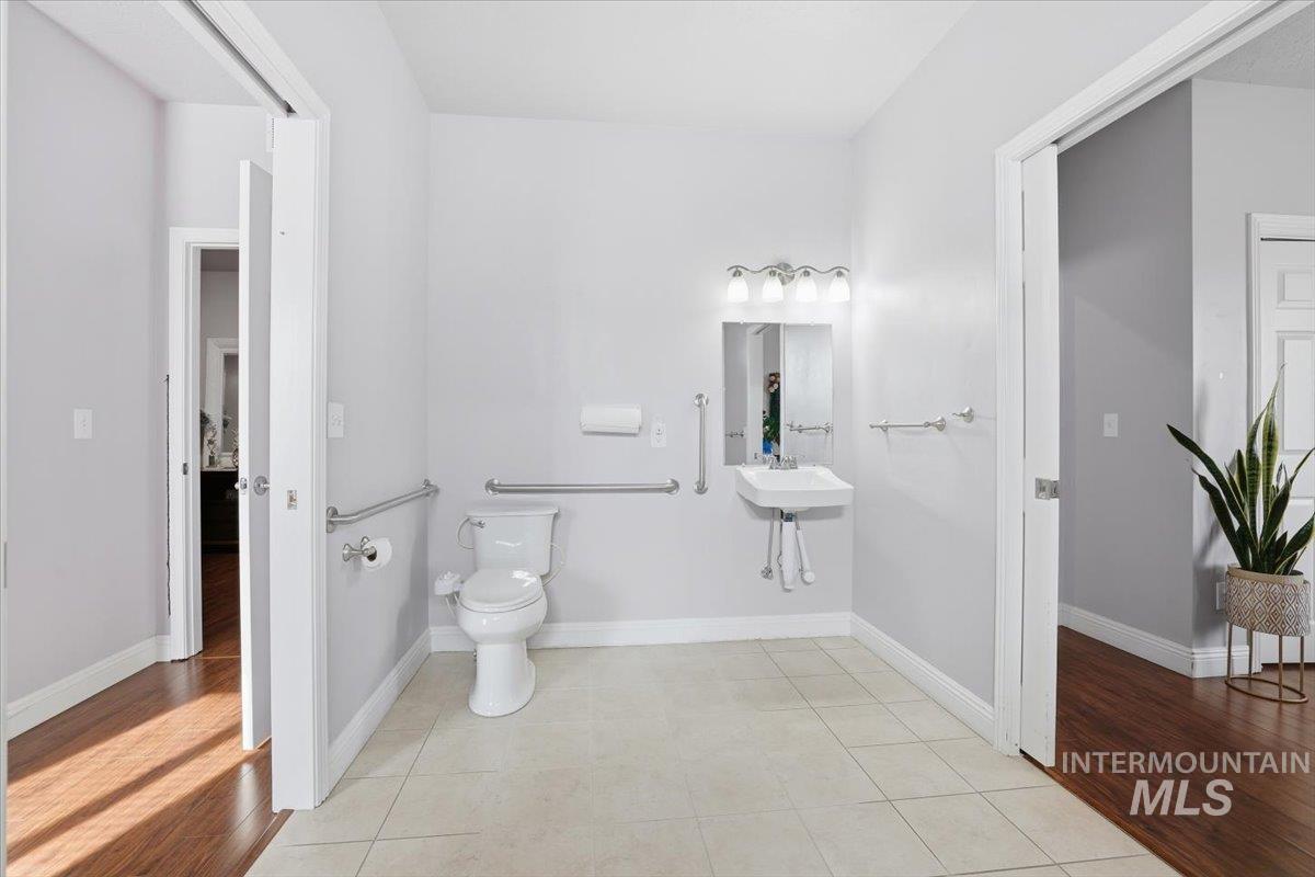 Bathroom featuring tile patterned flooring