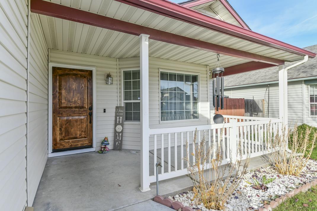 Entrance to property with covered porch