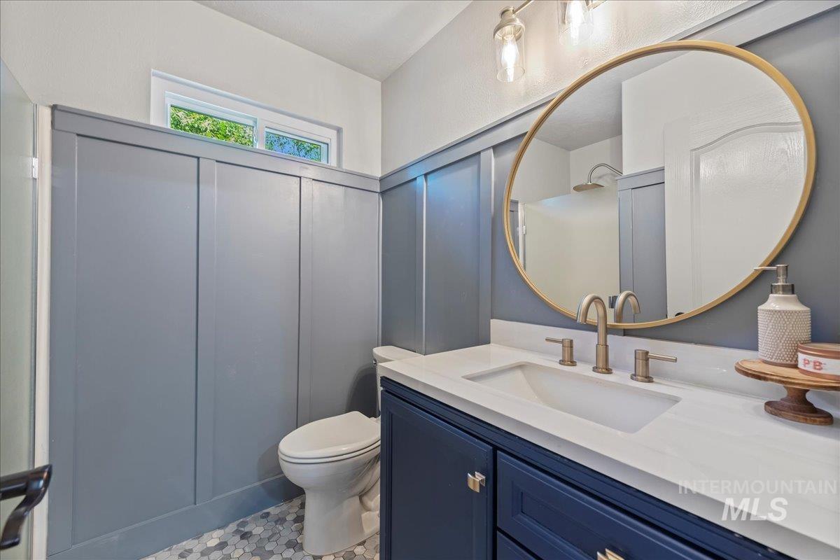 Bathroom with vanity and toilet