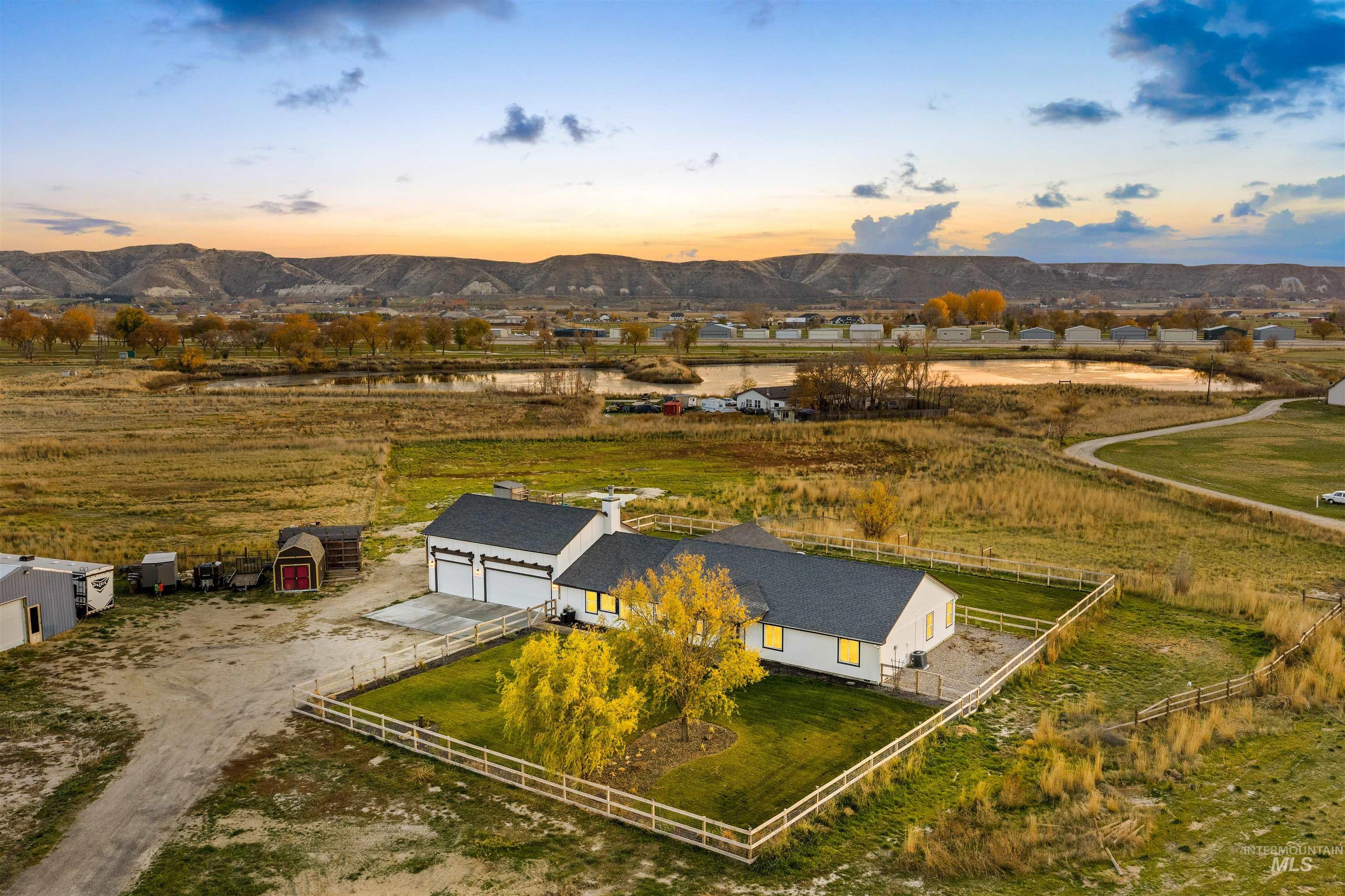 Aerial view at dusk of a view of countryside and a mountain view