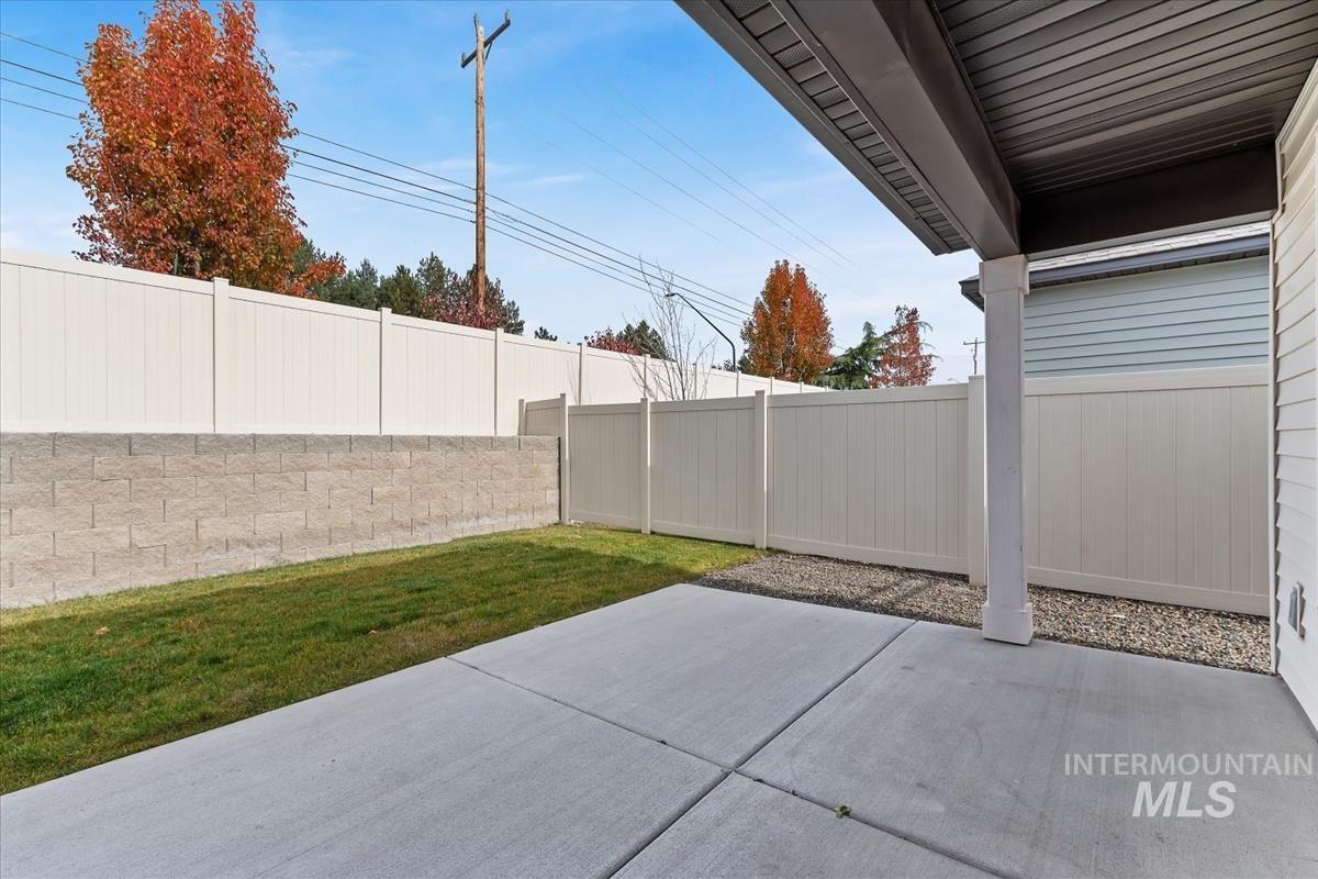 Fenced backyard featuring a patio area