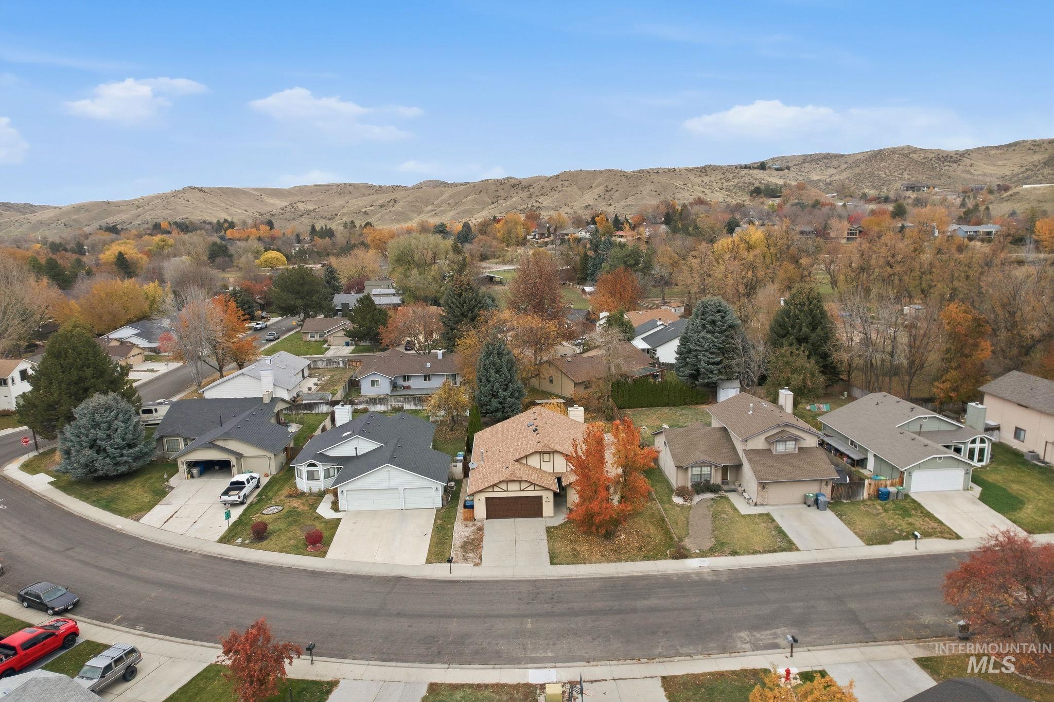 Aerial perspective of suburban area with mountains