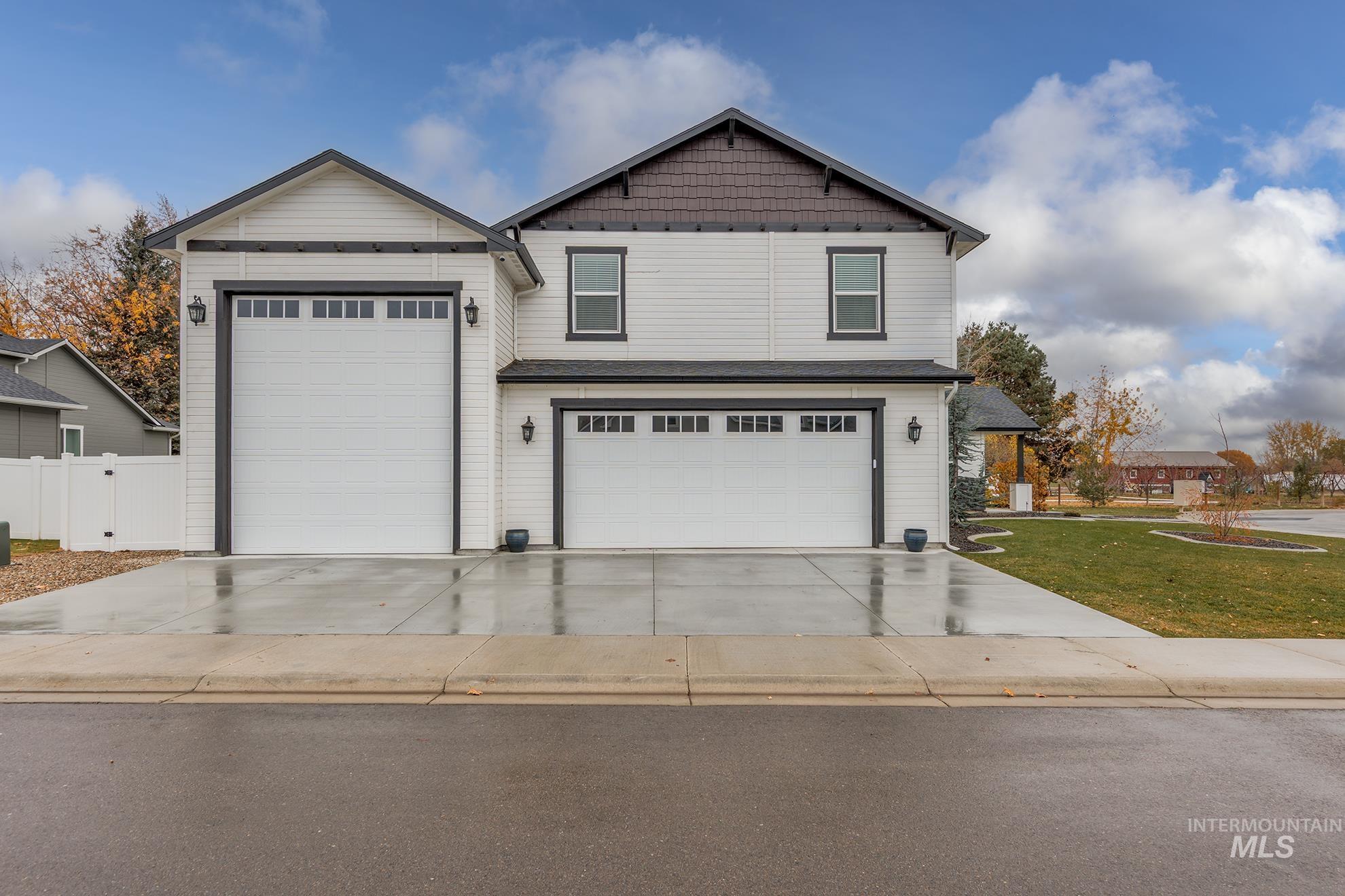 View of front of home featuring driveway