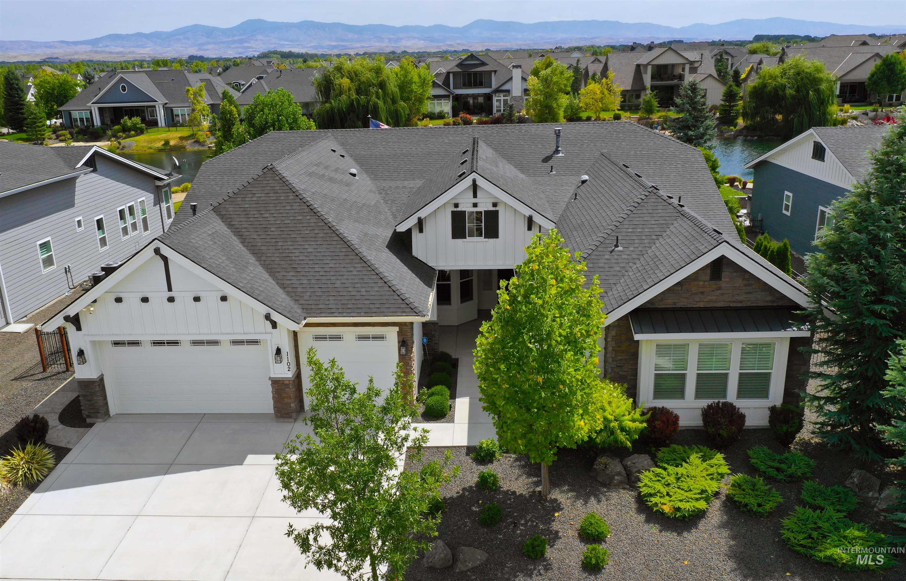 Aerial view of residential area with mountains
