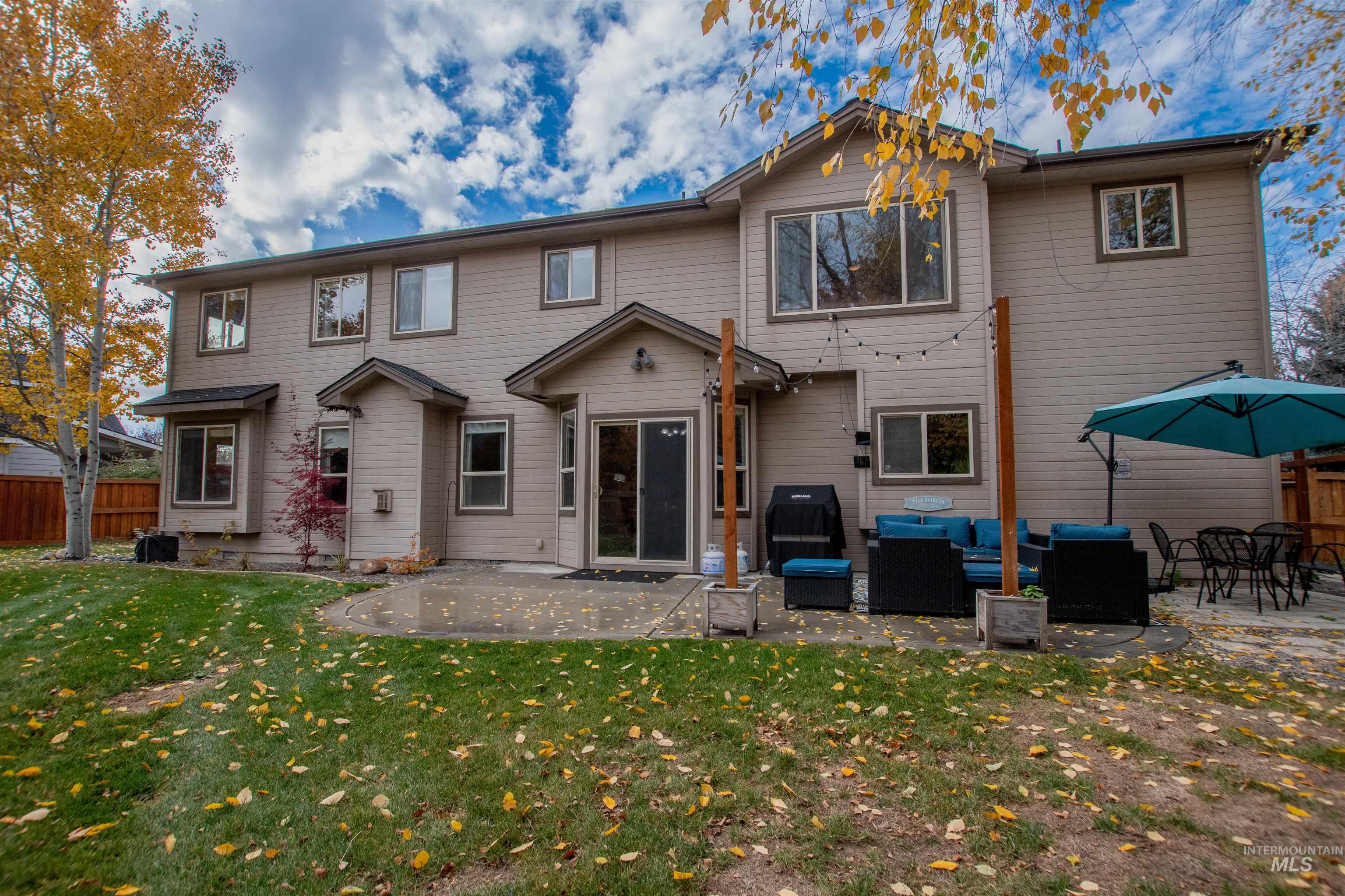 Rear view of house featuring a patio area and outdoor lounge area