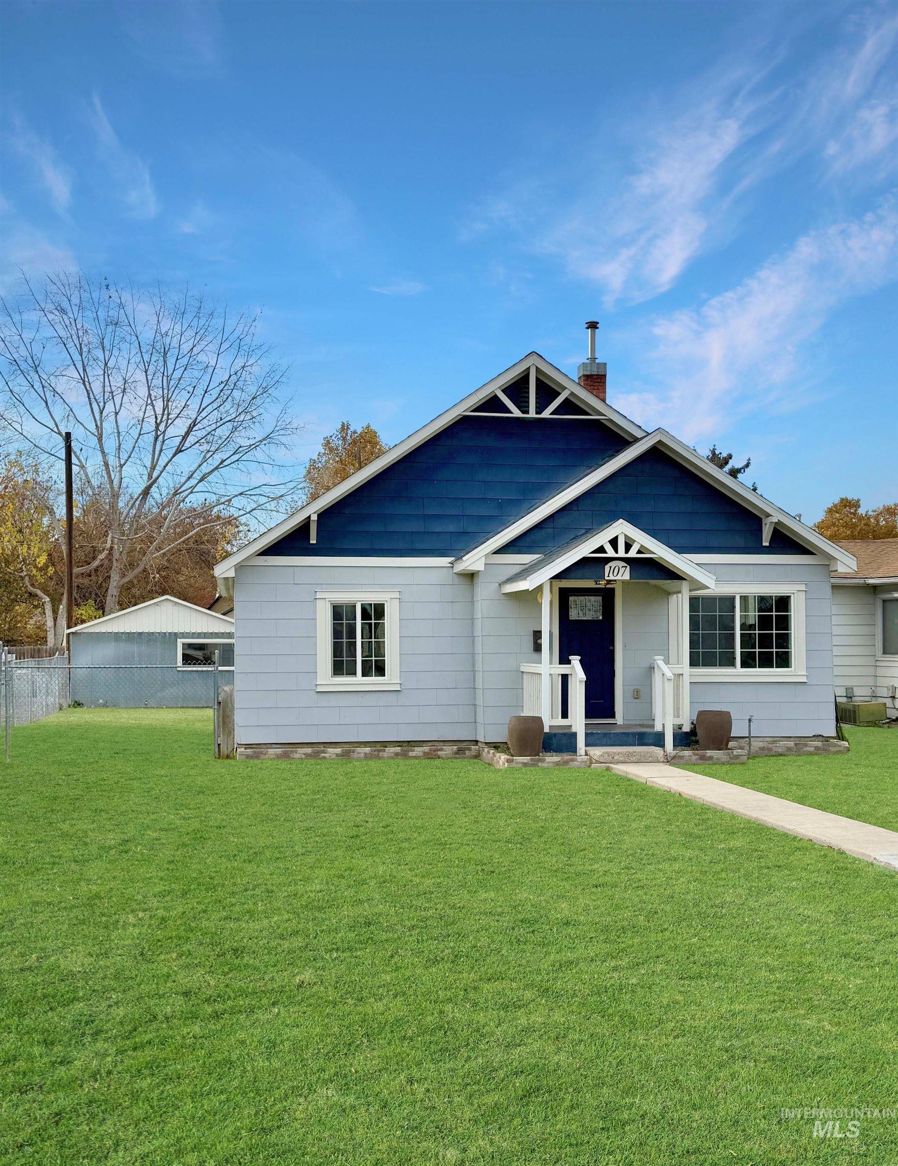 View of front of home with a chimney