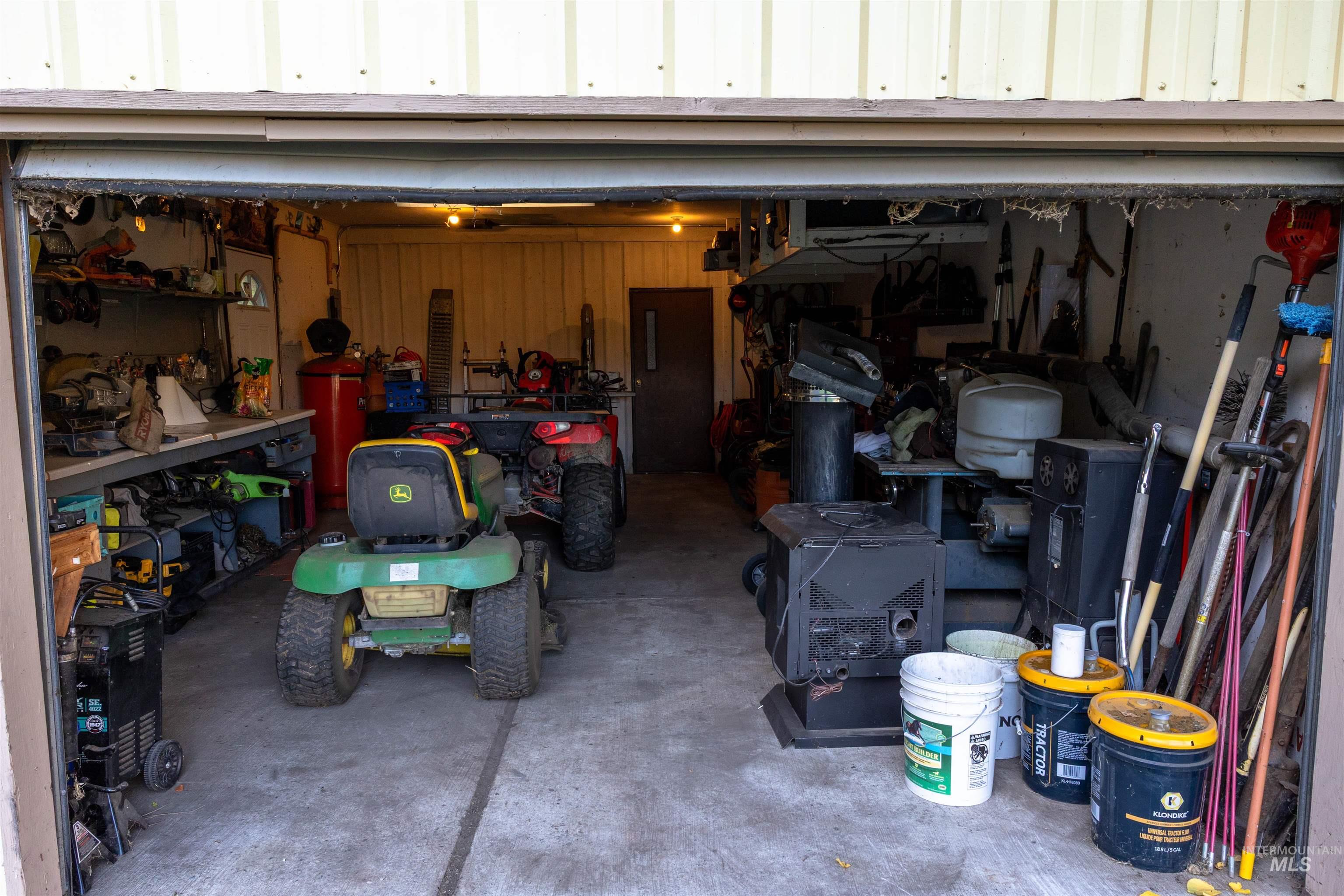 Garage featuring a workshop area