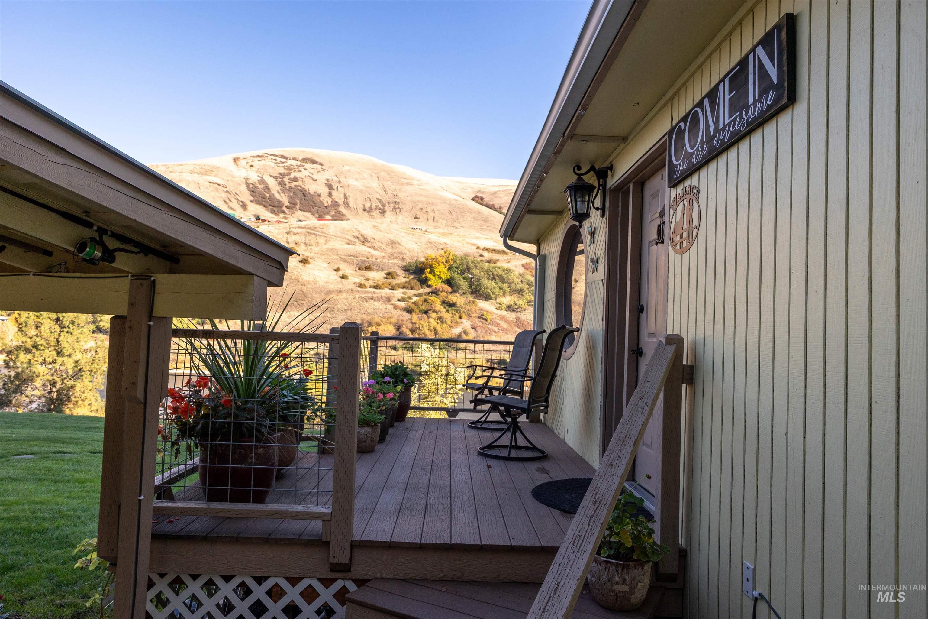 Wooden deck featuring a mountain view