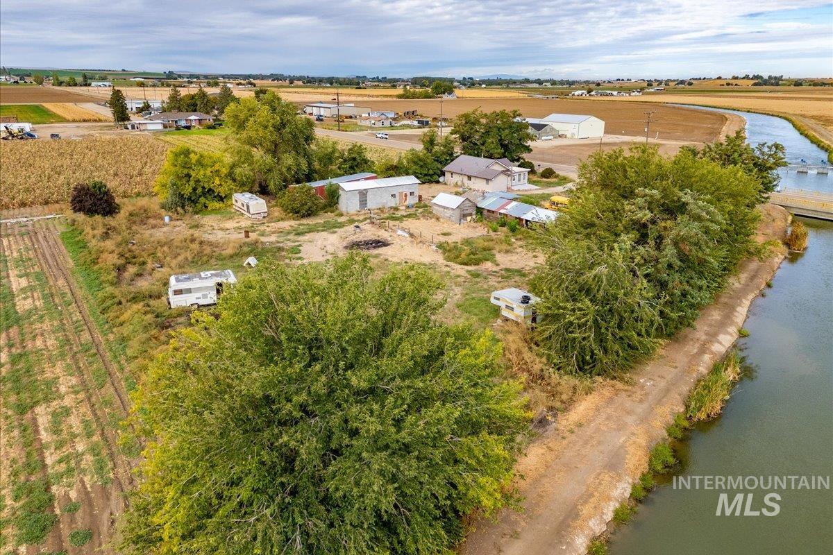 Overview of rural landscape with a nearby body of water