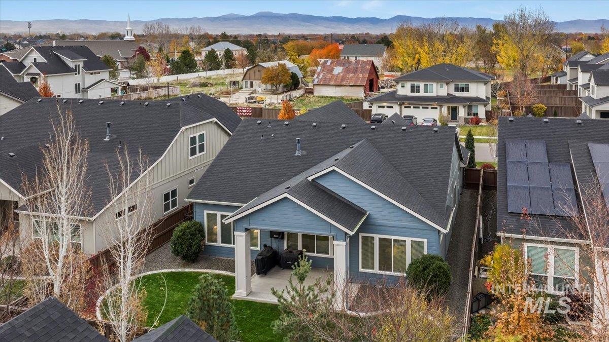 Aerial perspective of suburban area featuring mountains