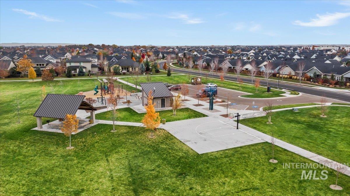 Aerial perspective of suburban area featuring a park