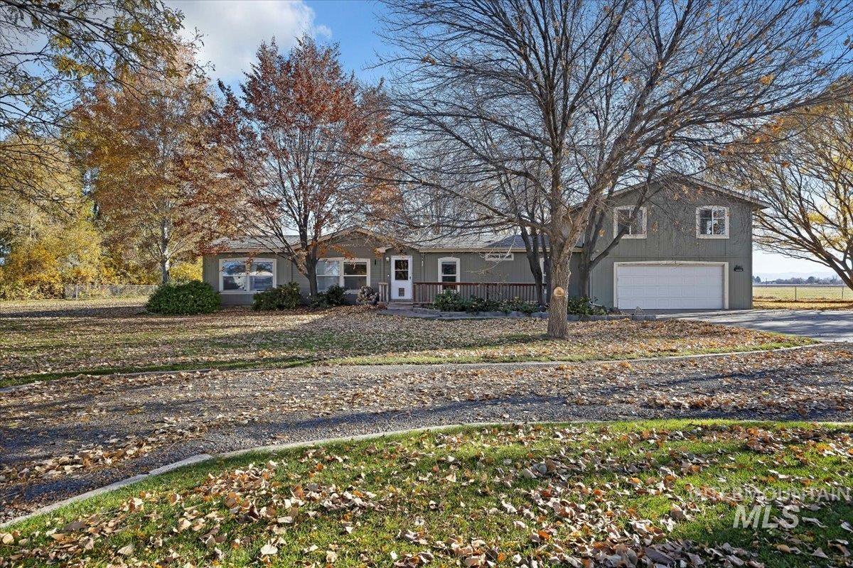 View of front of property featuring driveway