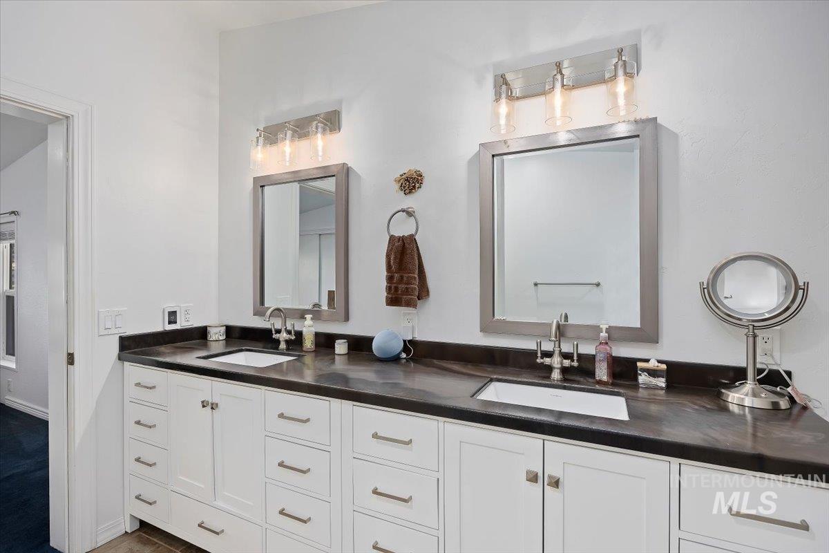Bathroom featuring double vanity