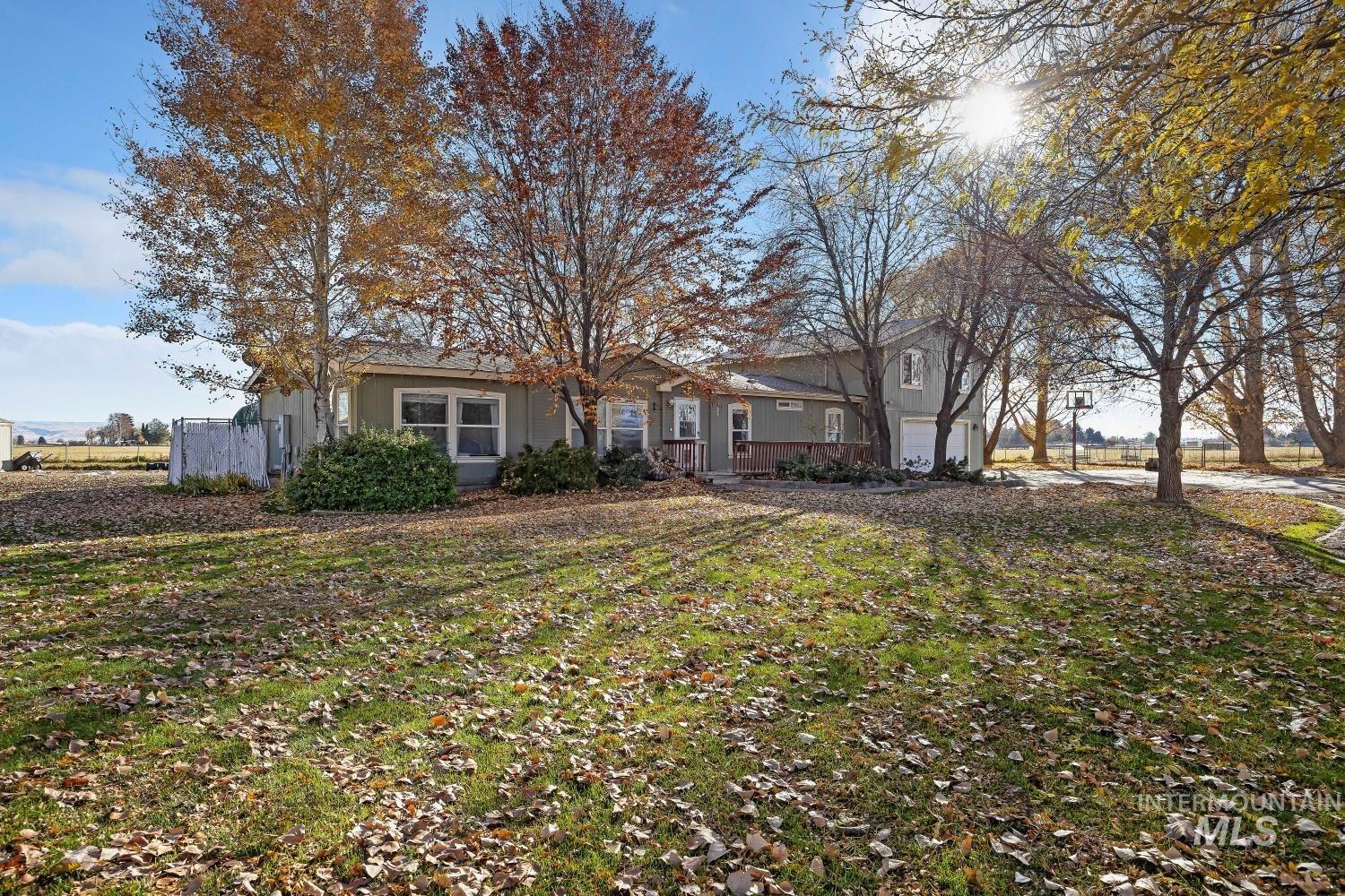 View of front facade featuring a garage