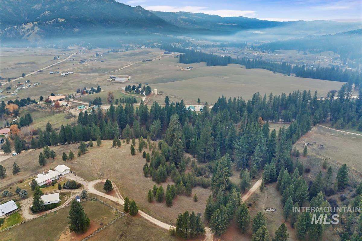 View of property location with mountains and rural landscape