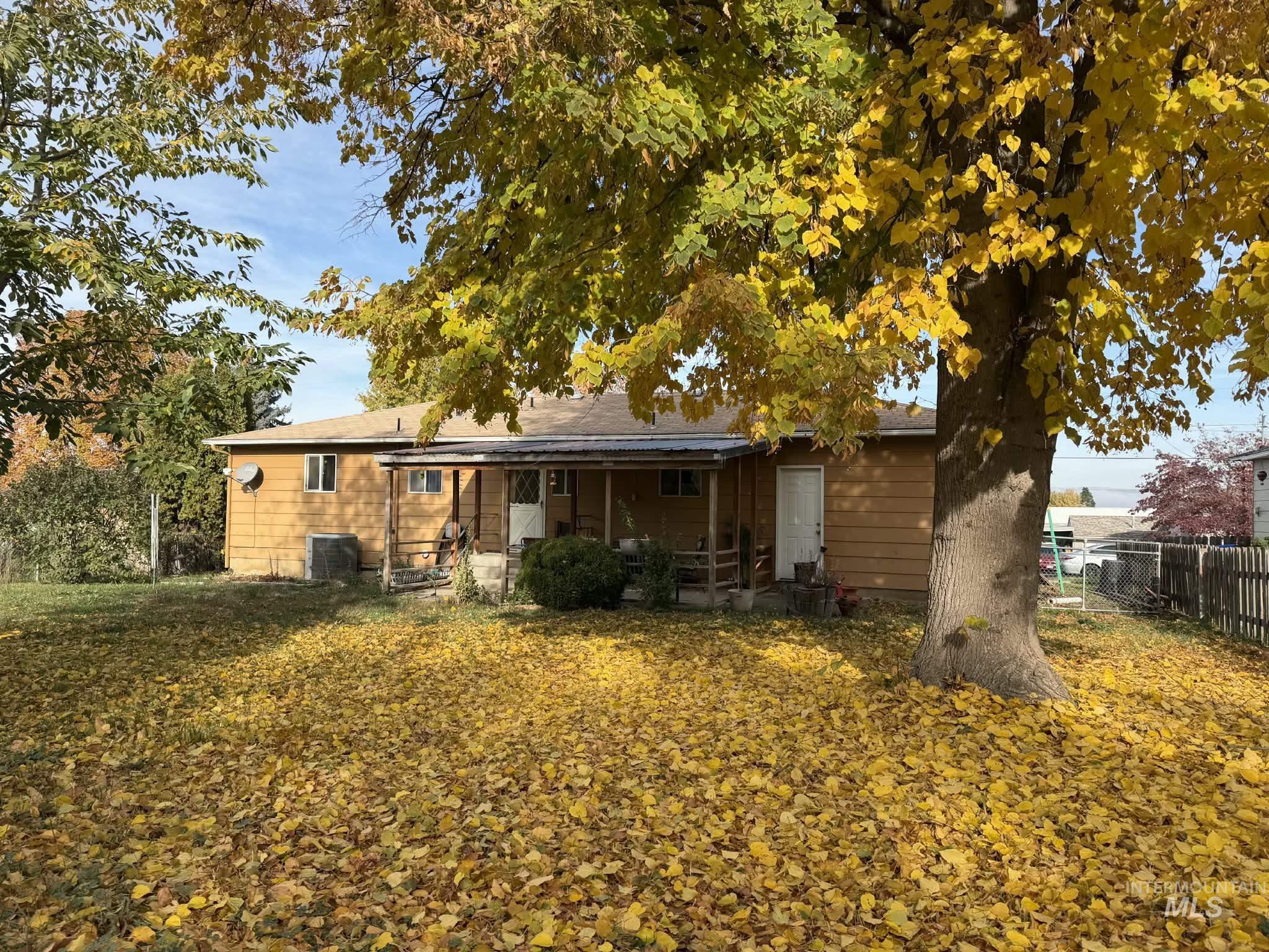 Rear view of house with a patio