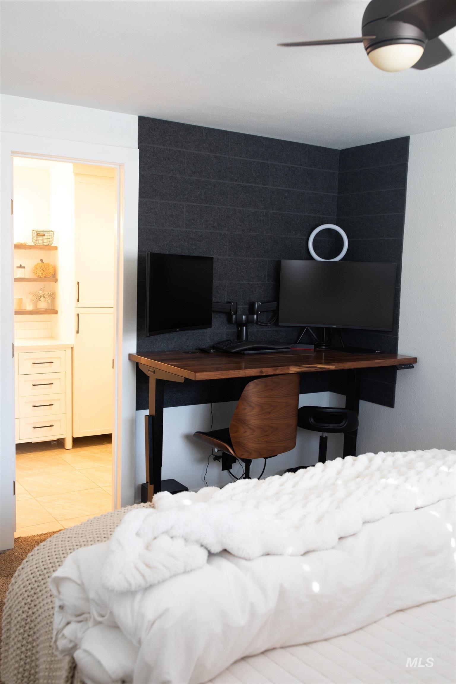 Primary with doorway to bathroom