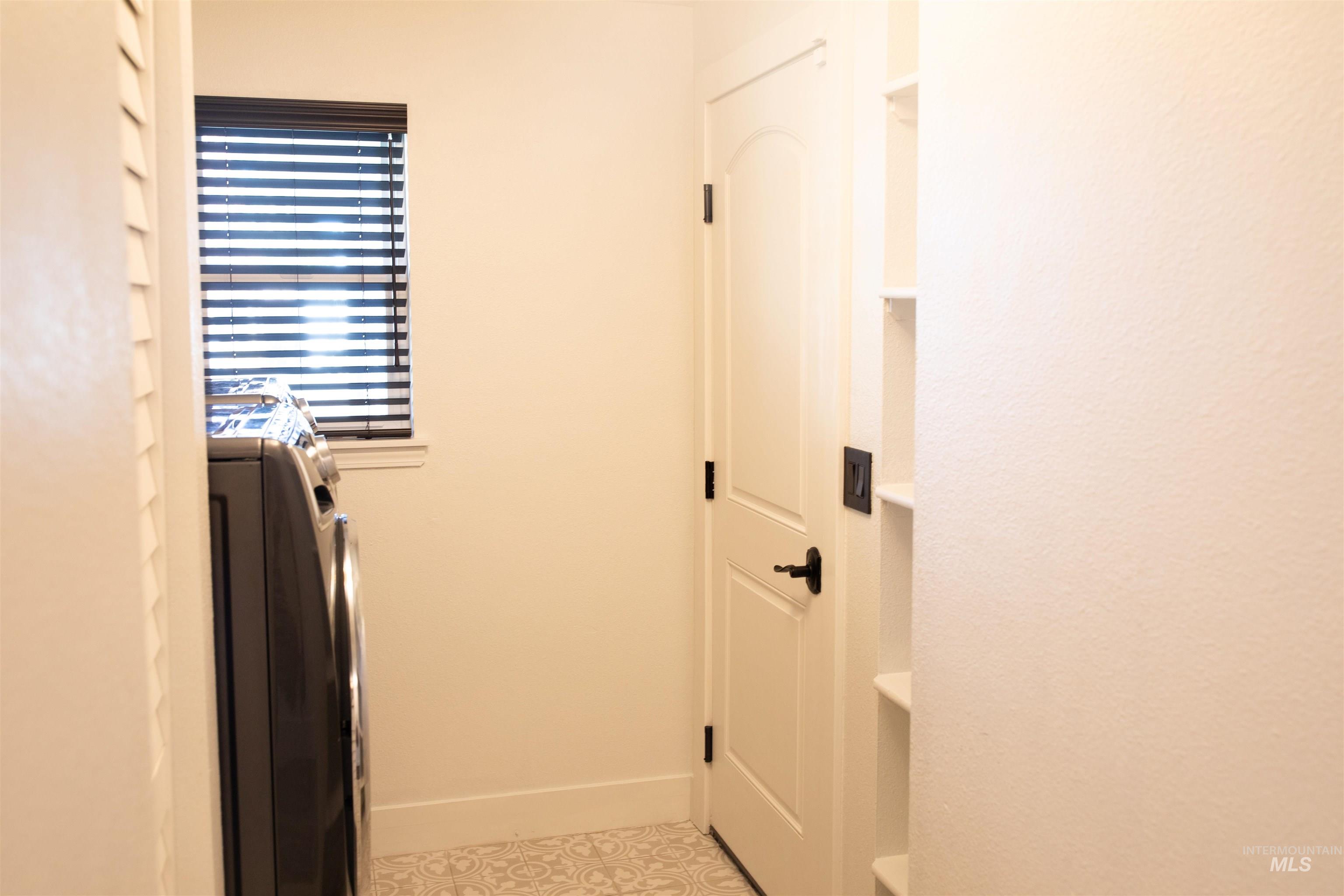 Laundry room with access to garage