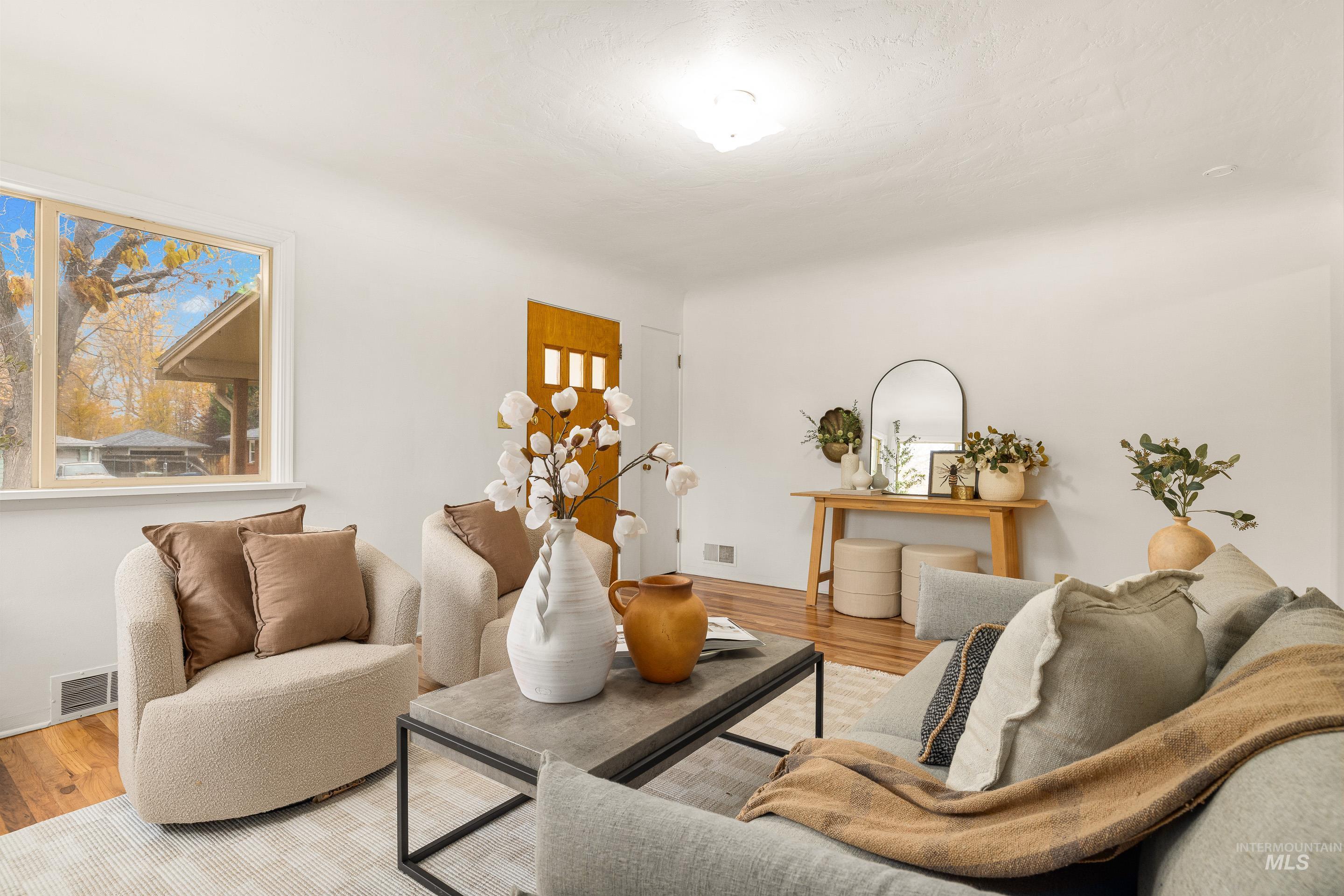 Living area with wood finished floors