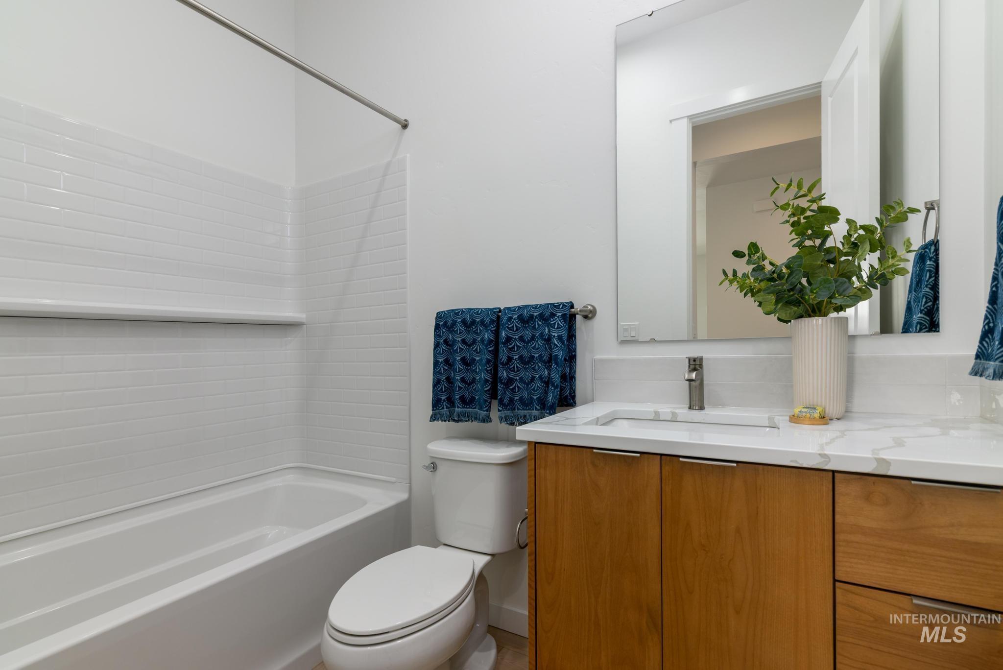 Full bathroom with vanity and shower / bathtub combination
