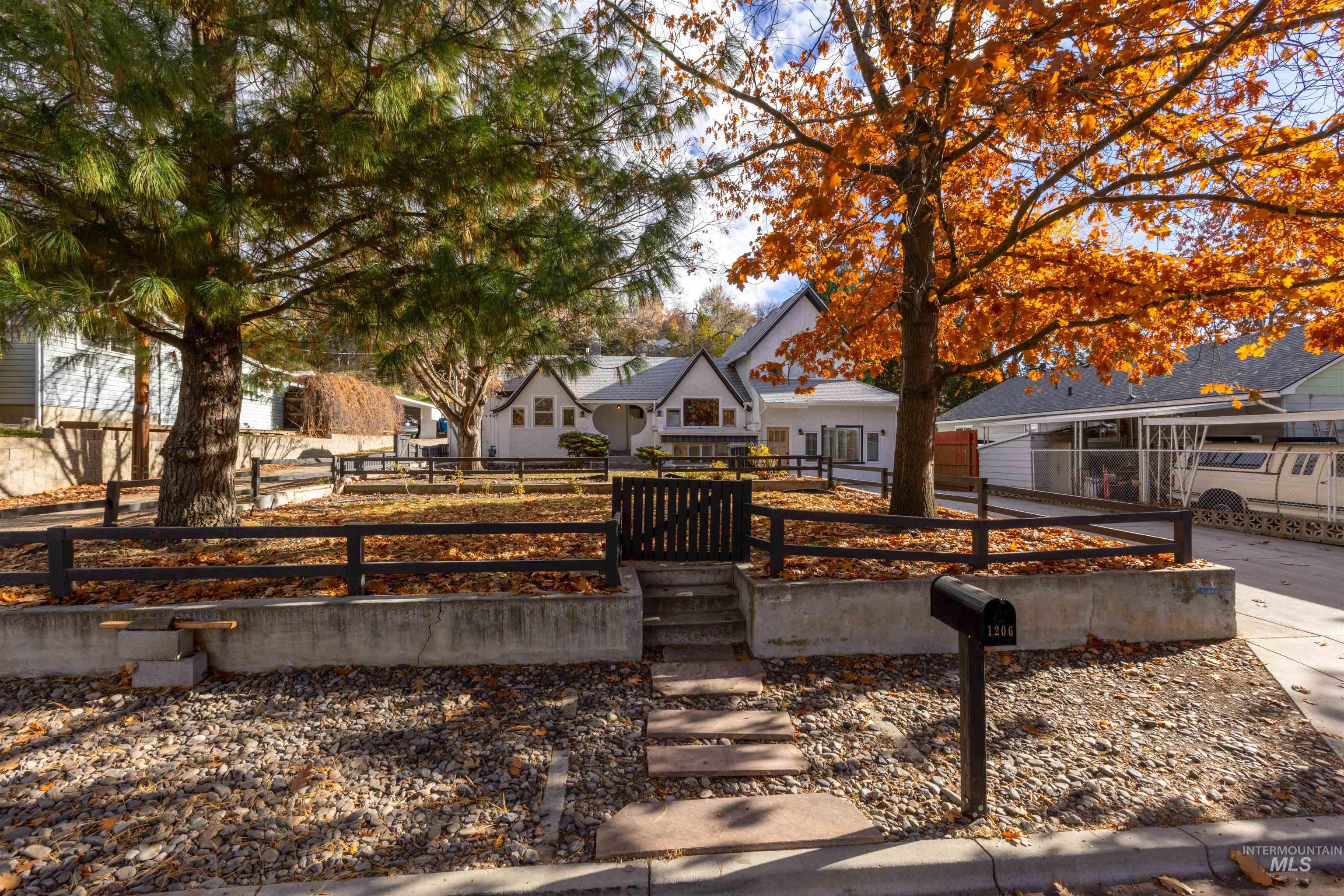 View of front facade with a fenced front yard