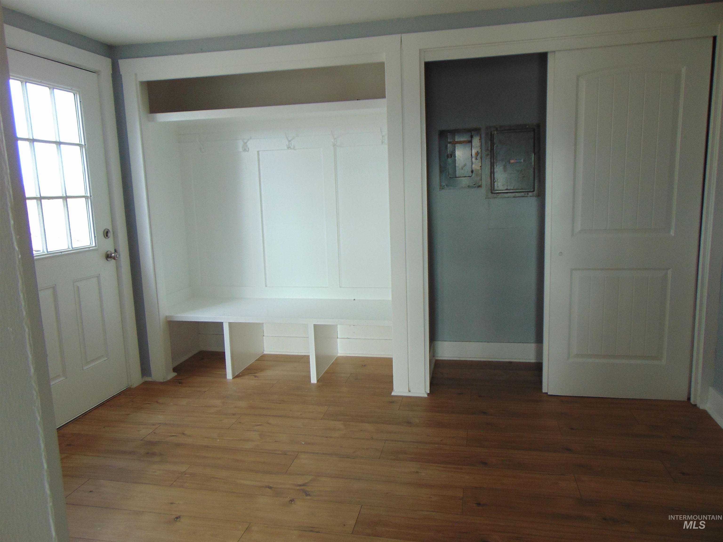 Mudroom featuring wood finished floors