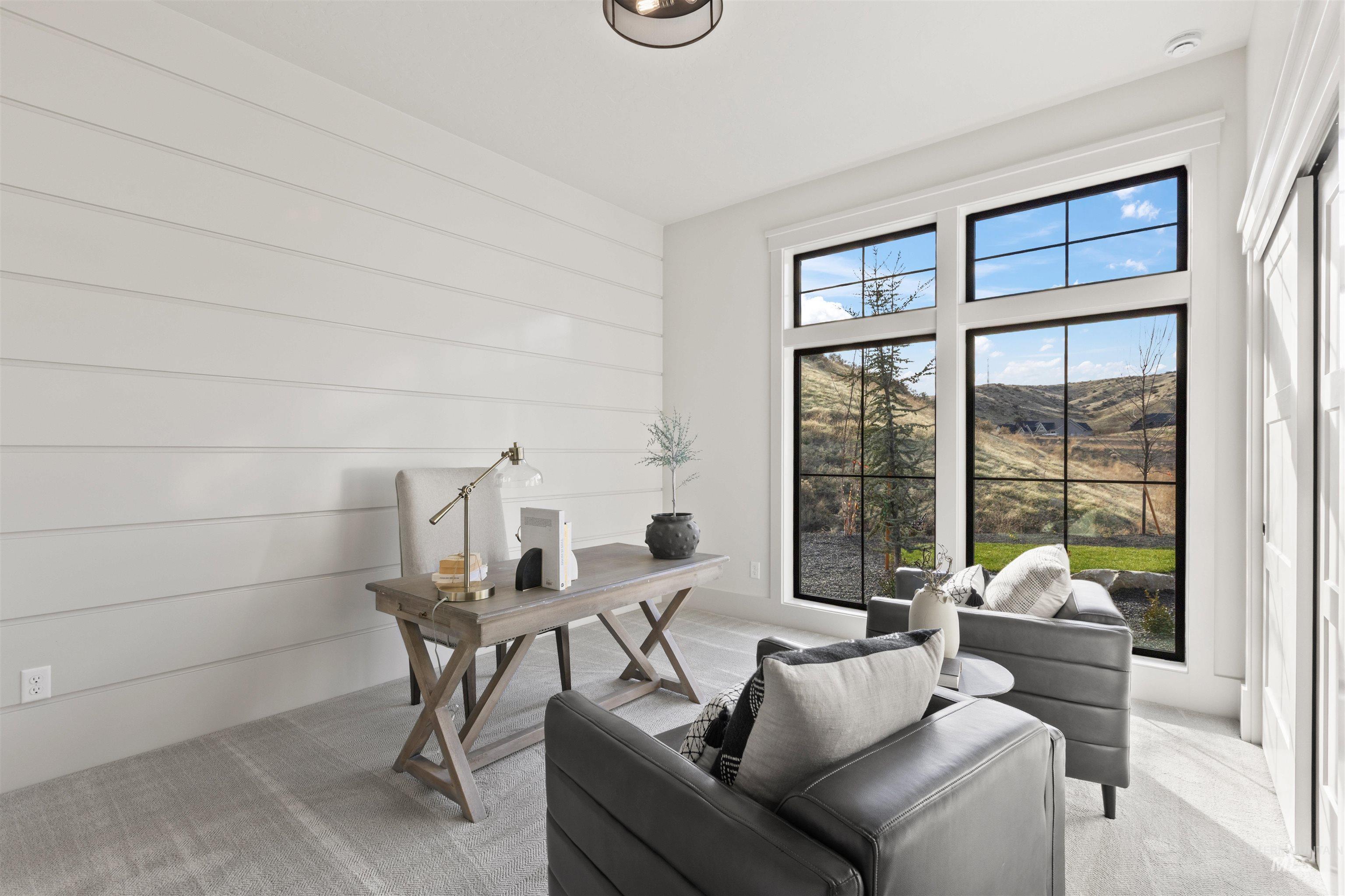 Office with light colored carpet