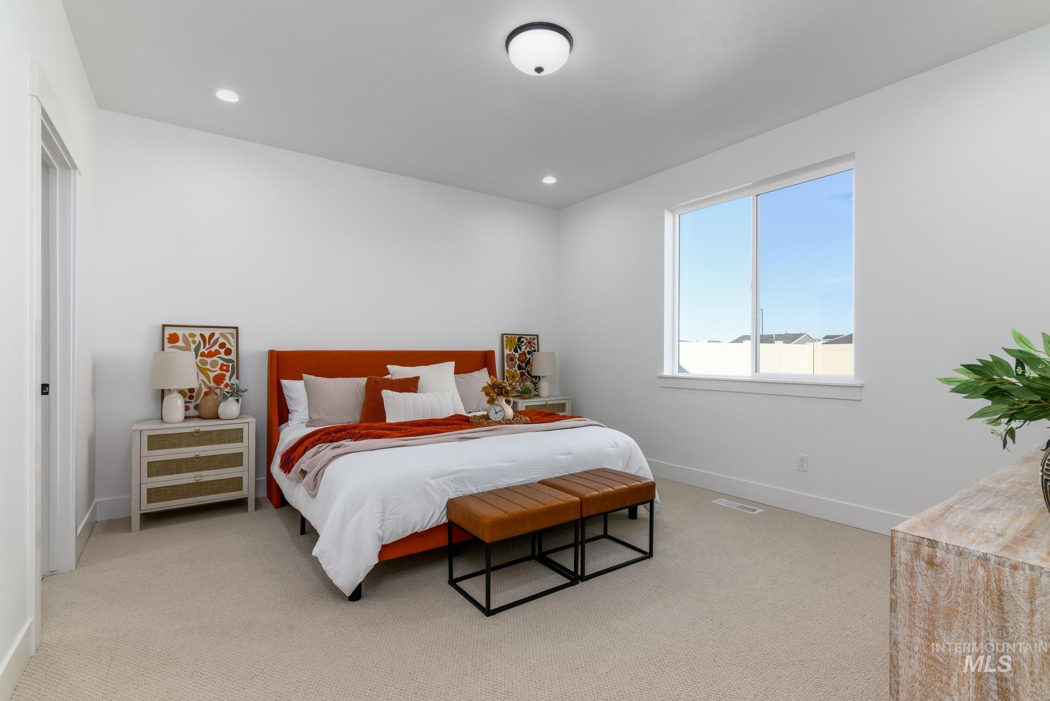 Bedroom featuring carpet and recessed lighting