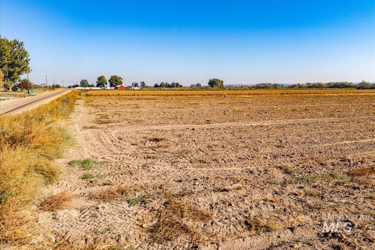 View of yard with a view of countryside