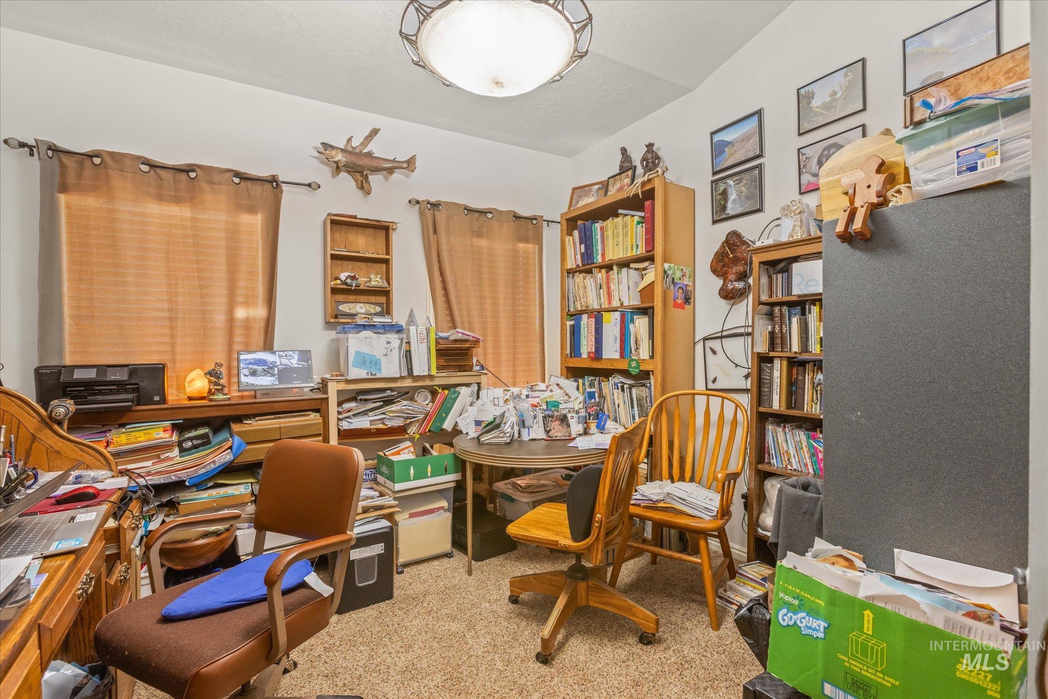 Office area featuring light colored carpet
