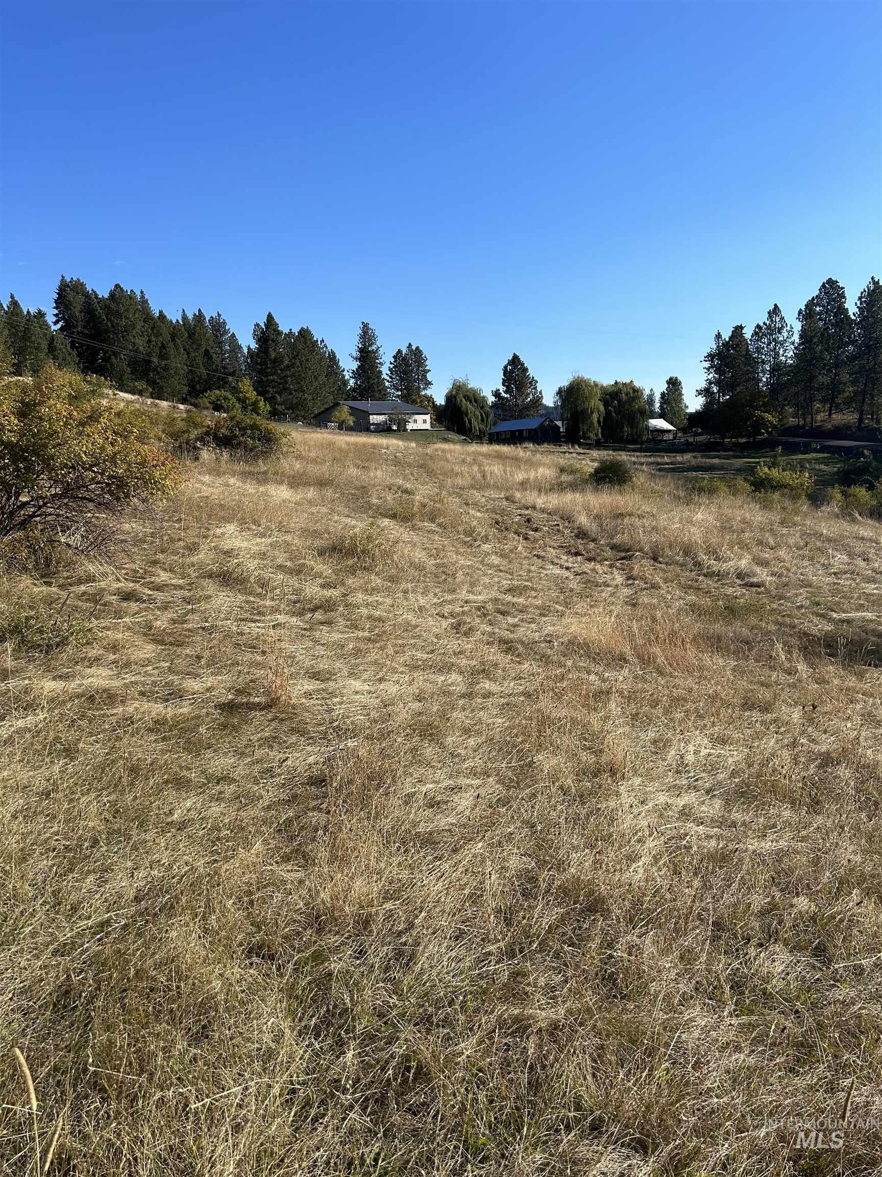 View of wooded area featuring a view of countryside