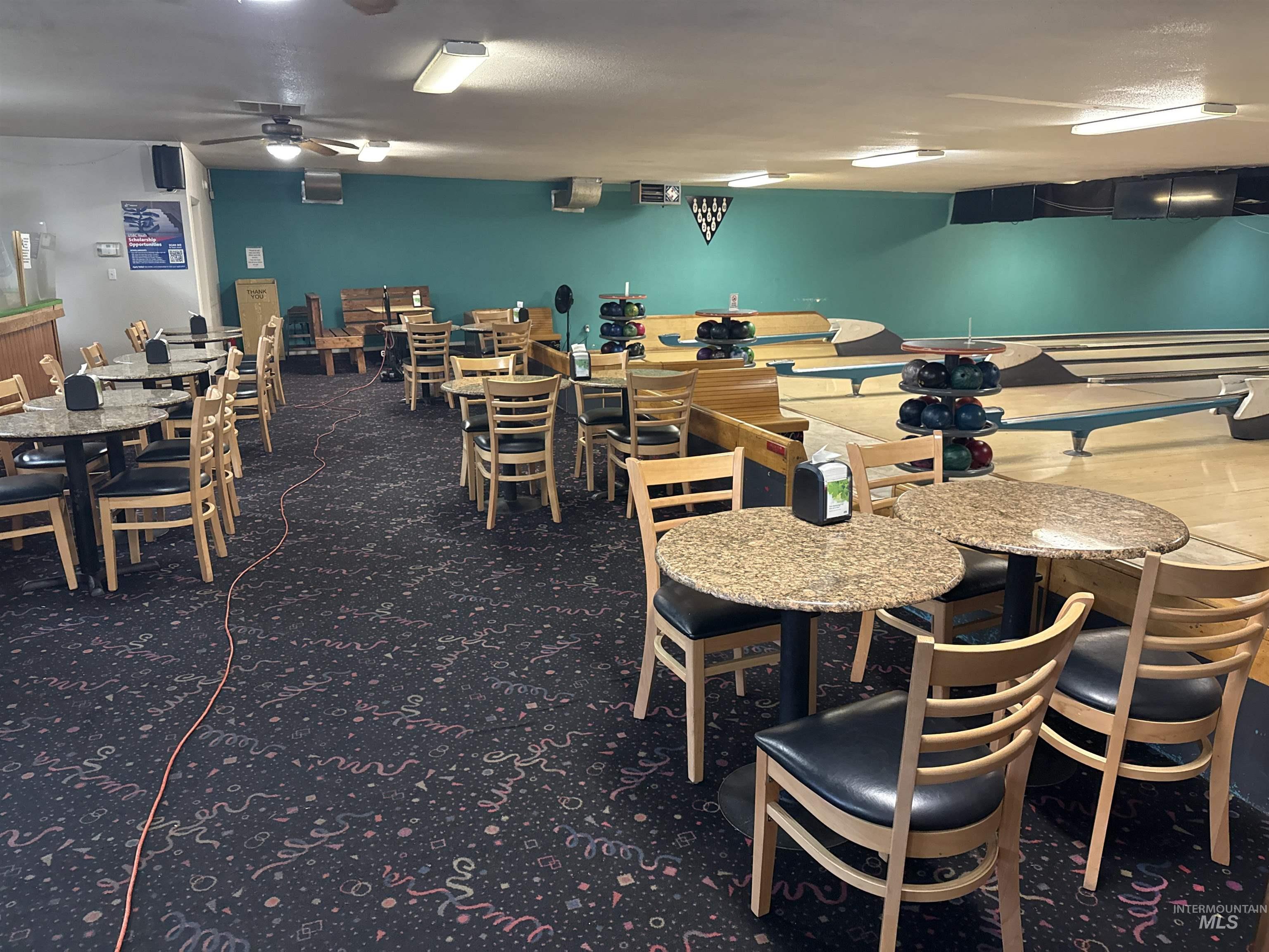 Dining space with a ceiling fan