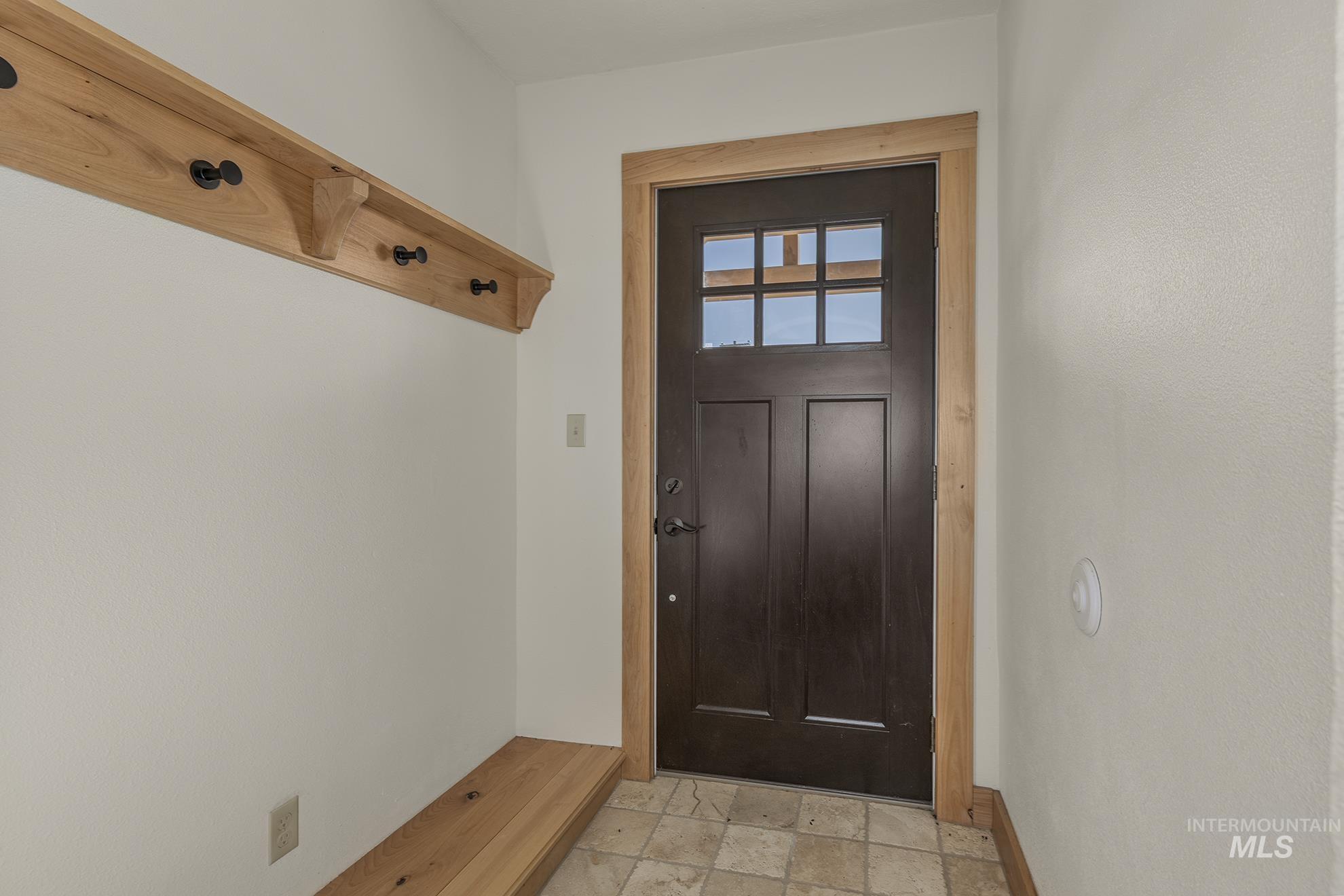 Entryway featuring stone finish flooring