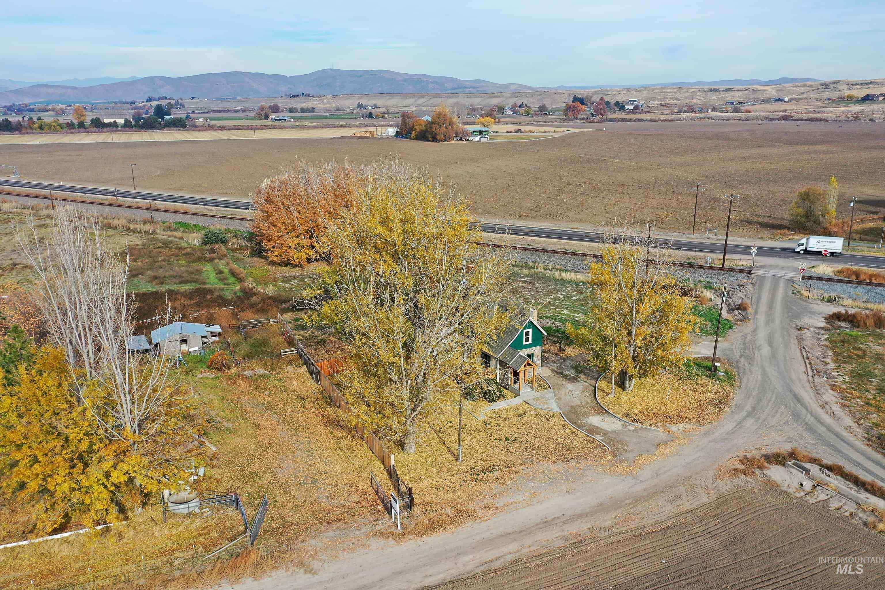Overview of rural landscape with a mountain backdrop