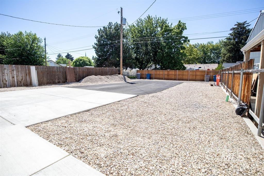 View of fenced backyard