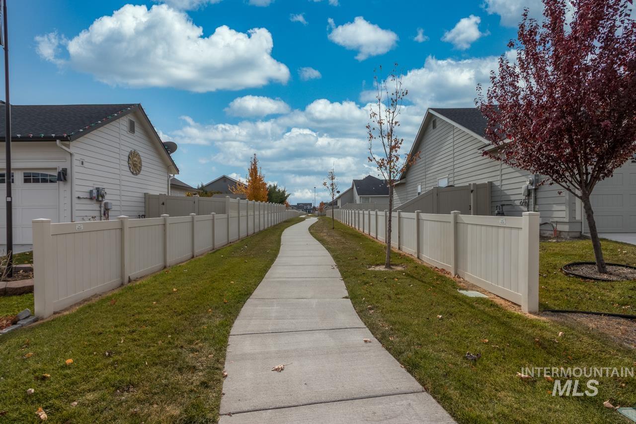 View of side of home with a residential view
