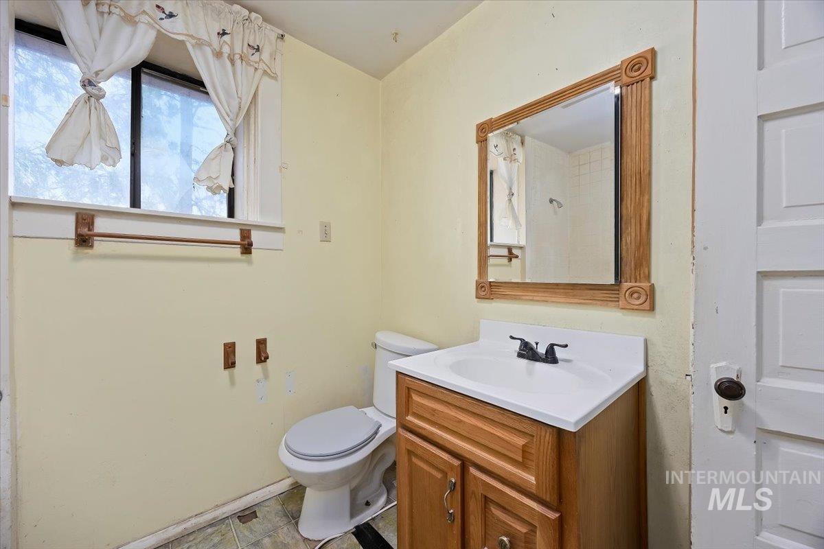 Bathroom with vanity and toilet