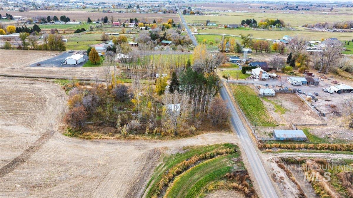 Aerial view of property's location with rural landscape