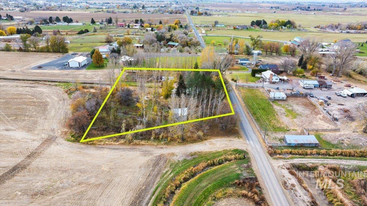 Overview of rural landscape featuring property parcel outlined