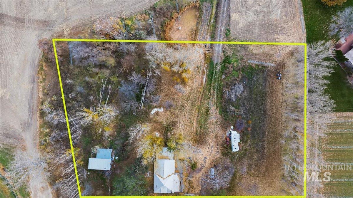 Overview of rural landscape with property parcel outlined