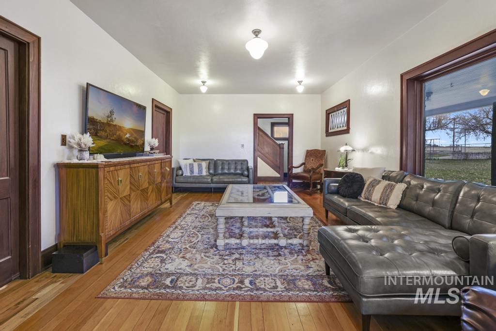 Living area with wood-type flooring