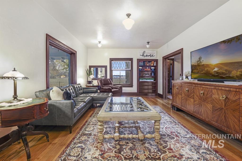 Living room featuring wood finished floors