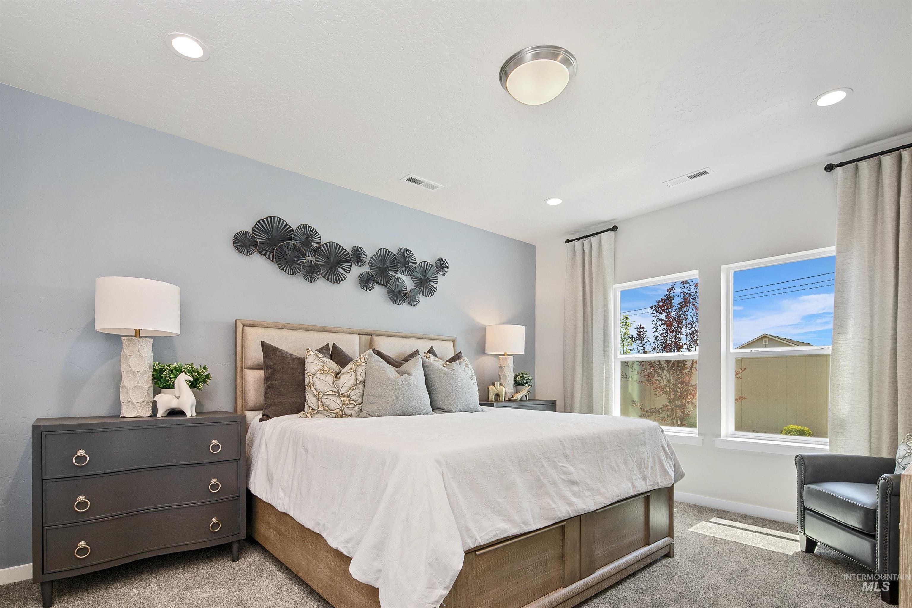 Bedroom with carpet floors and recessed lighting
