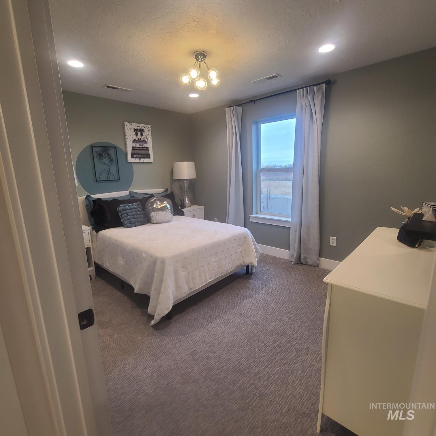 Bedroom featuring carpet and recessed lighting