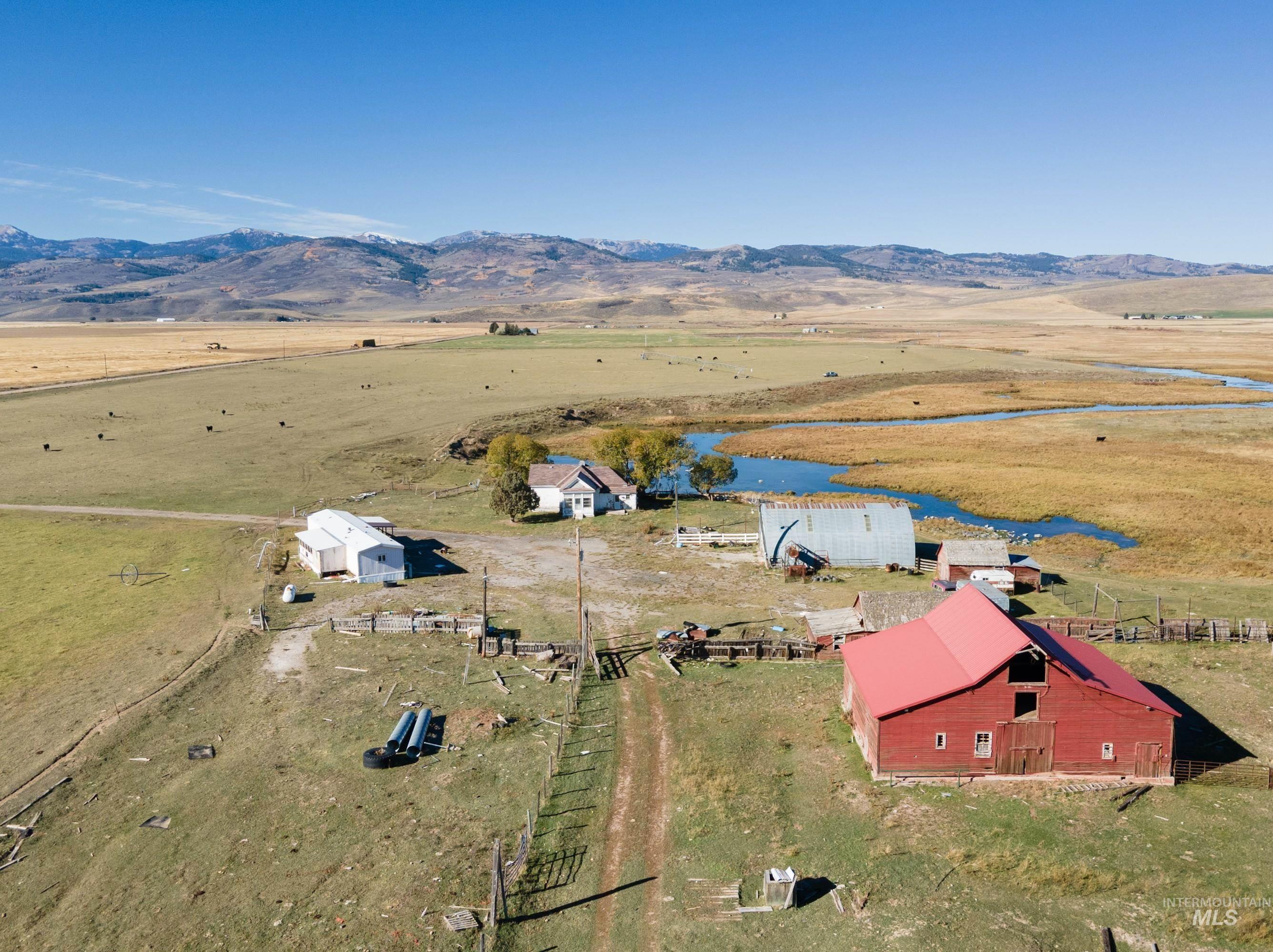 View of rural area featuring a pastoral area and a mountain backdrop